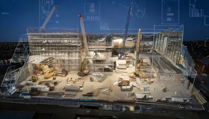 Construction site under low lighting with overlaid architectural blueprints, representing a commercial debt recovery case involving a fit-out contractor.